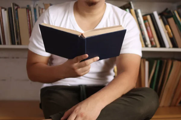 Anonymous Man Reading Book Library Educational Concept Happy Smiling Expression — Stock Photo, Image