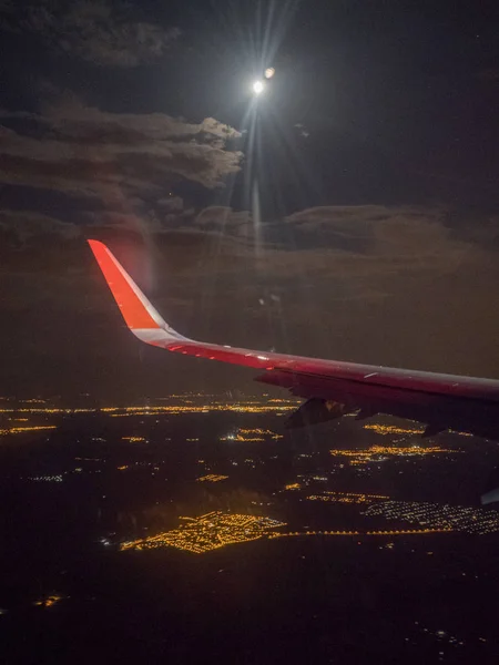 wing of an airplane at night