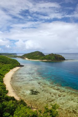 View of Drawaqa Island coastline and Nanuya Balavu Island, Yasaw clipart