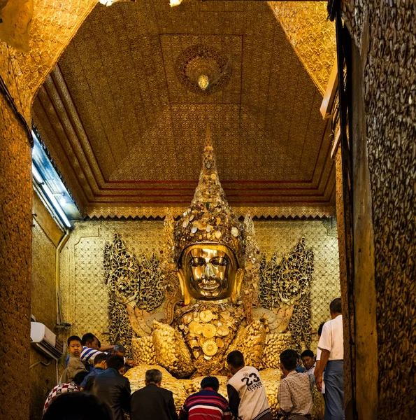 Mandalay, Myanmar - December 28., 2016: Interior of the Mahamuni Buddha (literal meaning: The Great Sage) temple, a Buddhist temple and major pilgrimage site, located southwest of Mandalay