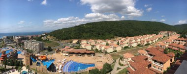 ELENITE, BULGARIA - JULY 16, 2016: Panoramic view of the Elenite Holiday Village, lying just 10 km North of Elenite Holiday Village offers stylish villas and hotel accommodation clipart