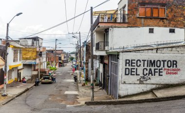 PEREIRA, COLOMBIA - OCTOBER 25, 2015: Favela in Pereira. The city is located in the foothills of the Andes in a coffee-producing area of Colombia officially known as the Coffee Axis. clipart