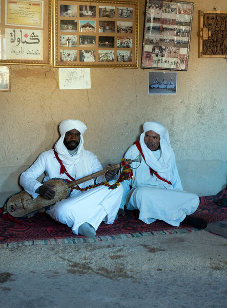 KHAMLIA, MOROCCO - DECEMBER 30, 2017: Black descendants of former freed slaves, practicing Gnawa music, in a small village near the desert