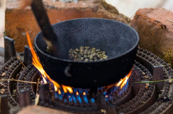 Traditional roasting of coffee in Colombia