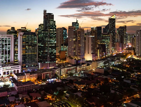 aerial view of downtown miami at night with urban skyscrapers