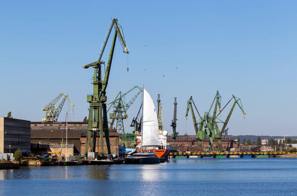 GDANSK, POLAND - SEPTEMBER 19, 2015: The shipyard of Gdansk. The city is the historical capital of Polish Pomerania with medieval old town architecture.