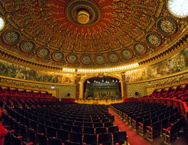 BUCHAREST, ROMANIA - MAY 2, 2017: Interior of Romanian Athenaeum George Enescu (Ateneul Roman) opened in 1888 is a concert hall in the center of Bucharest and a landmark of the Romanian capital city. clipart