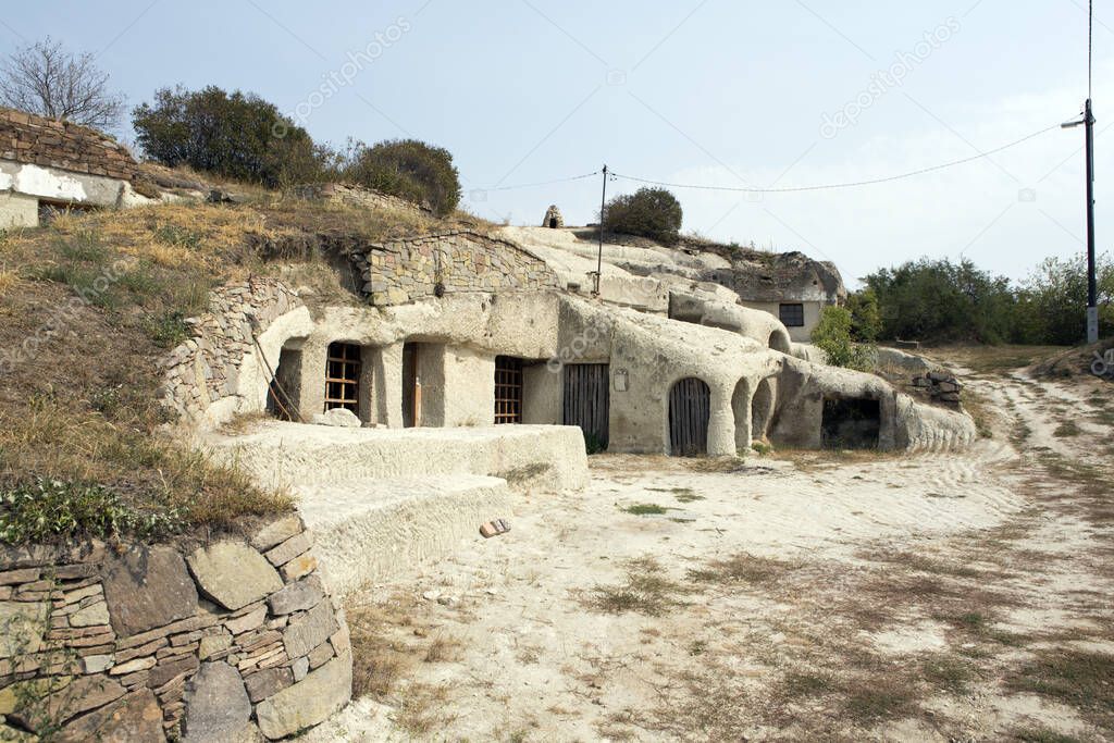 NOSZVAJ, HUNGARY - SEPTEMBER 1, 2012: Cave houses, were cut into the soft rhyolite stone in the 19th century by families too poor to purchase houses, today few have been turned into artists workshops