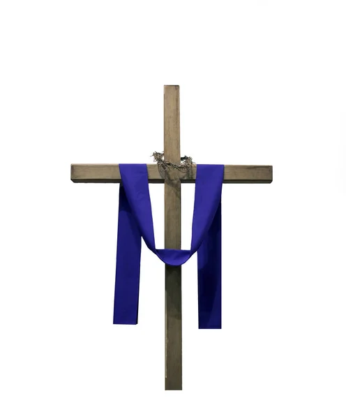 Wooden cross draped with purple fabric and thorns — Stock Photo, Image