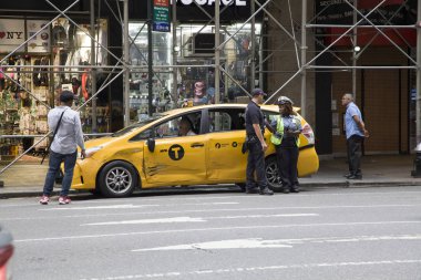 FDNY and NYPD arrive after taxi accident in NYC clipart