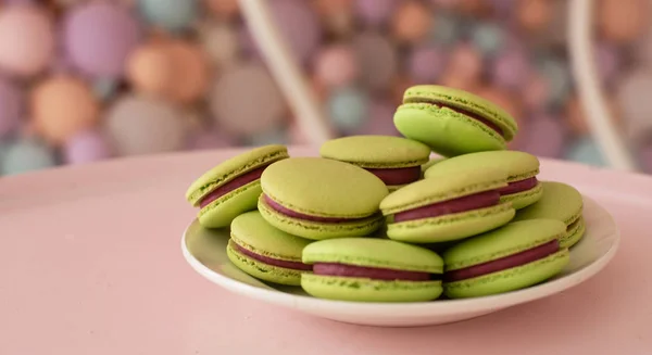 Pistachio Macaroons on Pastel Background Party, Copy Space Card, Sweet Tasty Macaroons