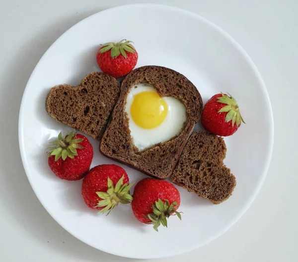 Healthy food on plate, bread, eggs breakfast