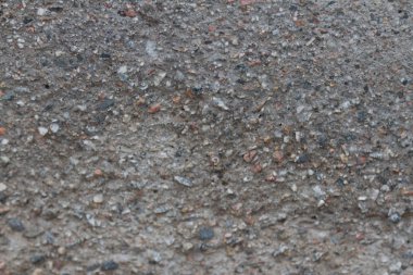 dikey bir bodrum duvarında granüler beton doku