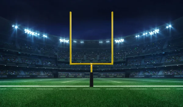 Stadio della American Football League con portiere giallo davanti e tifosi, campo illuminato vista frontale di notte — Foto Stock