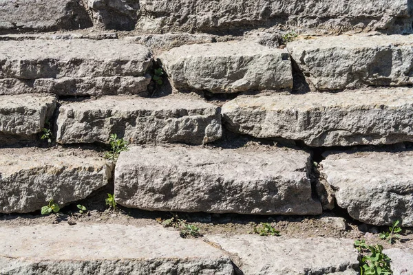 Die alte Mauer aus grauen Steinen — Stockfoto