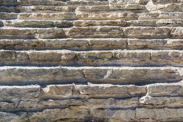 Die alte Mauer aus grauen Steinen — Stockfoto