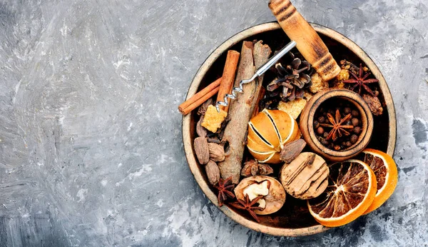 Ingredients for traditional drink on winter holiday.Winter drink mulled wine