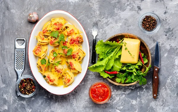 Italian style stuffed pasta shells with meat.Stuffed ricotta cheese shells.Flat lay.Long banner