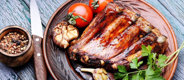 Delicious grilled barbecue pork rib on plate.Spareribs.American cuisine