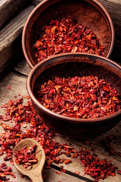 Sweet red sliced pepper as seasoning.Indian spices.Hot chili.