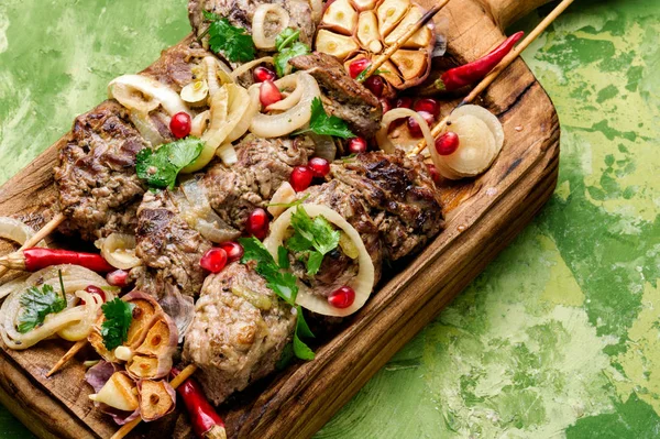 Grilled beef on bamboo skewers — Stock Photo, Image