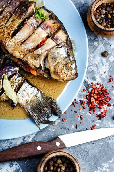 Tasty baked fish on plate — Stock Photo, Image