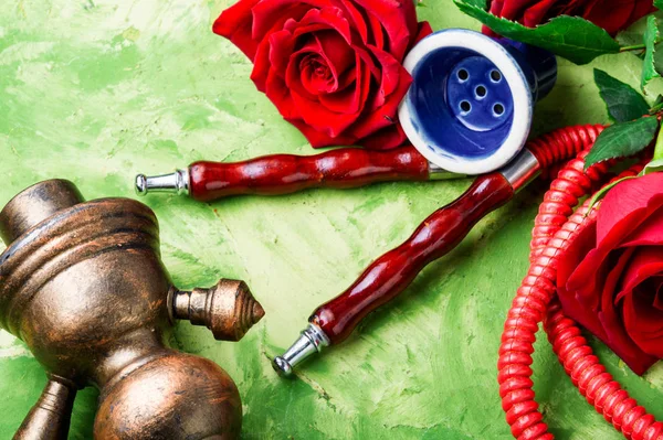 Smoking hookah with rose flavor — Stock Photo, Image