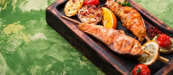 Grilled salmon on cutting board — Stock Photo, Image