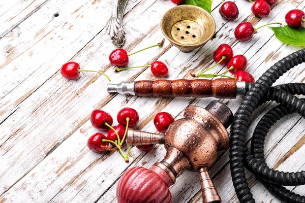 Hookah with tobacco taste of cherry — Stock Photo, Image