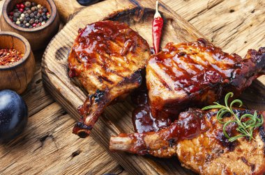 Roasted sliced barbecue pork ribs clipart