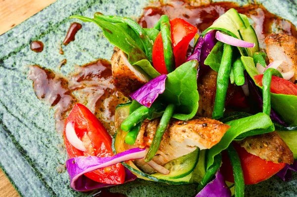 Diet salad with grilled meat,cabbage,cucumber and asparagus beans.