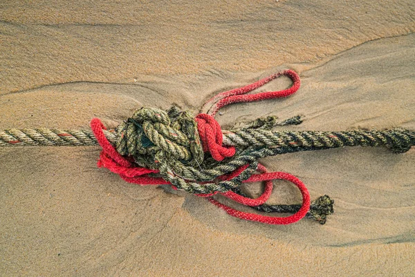 Red knotted ships rope 8