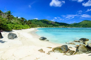 Petite Anse - beautiful beach on island Mahe, Seychelles clipart