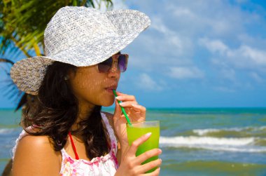 Refreshing Cocktail at beach in Belize - recreation in tropical destination for vacation - paradise coast clipart