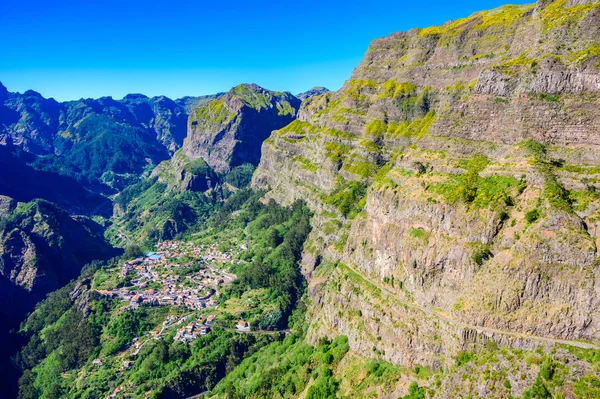 stock image View from Eira do Serrado to Curral das Freiras village in the Nuns Valley in beautiful mountain scenery, municipality of Cmara de Lobos, Madeira island, Portugal. 