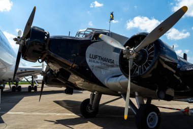 BERLIN - APRIL 28, 2018: Transport aircraft Junkers Ju 52/3m. Lufthansa. Exhibition ILA Berlin Air Show 2018. clipart