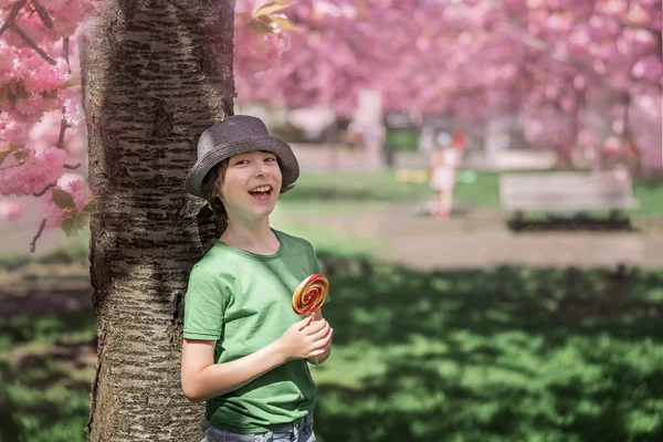 Portrait Joyful Boy Shirt Hat Standing Background Flowering Trees His — Stock Photo, Image