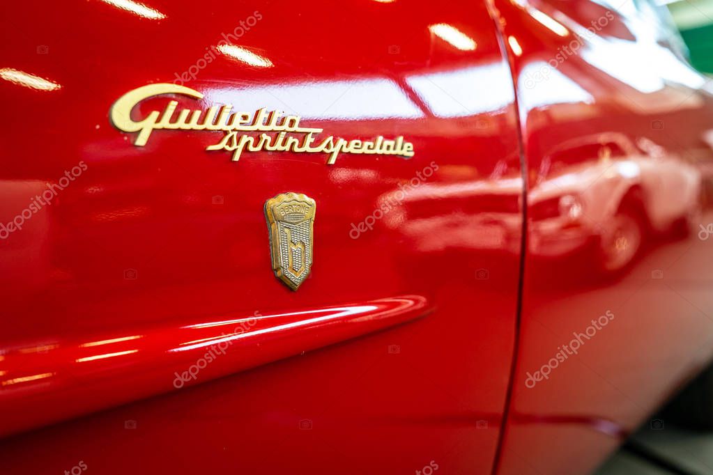 PAAREN IM GLIEN; GERMANY - MAY 19; 2018: Emblem of sports car Alfa Romeo Giulietta Sprint Speciale. Rear view. Coachbuilder Bertone. Die Oldtimer Show 2018.
