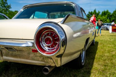 PAAREN IM GLIEN, GERMANY - MAY 19, 2018: Rear stoplights of the personal luxury car Ford Thunderbird (third generation). Die Oldtimer Show 2018. clipart
