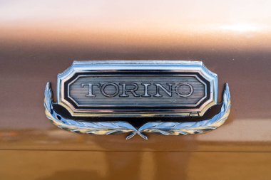 PAAREN IM GLIEN, GERMANY - MAY 19, 2018: Emblem of a mid-size car Ford Torino 500, 1971. Die Oldtimer Show 2018. clipart