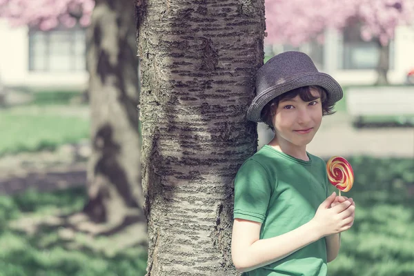 Joyful Boy Holding Lollipop His Hands Vintage Toning — Stock Photo, Image