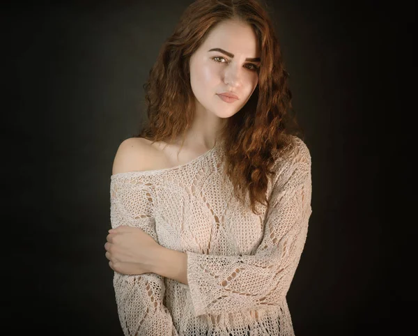 Portrait of beautiful emotional woman with green eyes. Studio shot.