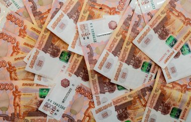 Beş binde banknotların arka plan olarak.