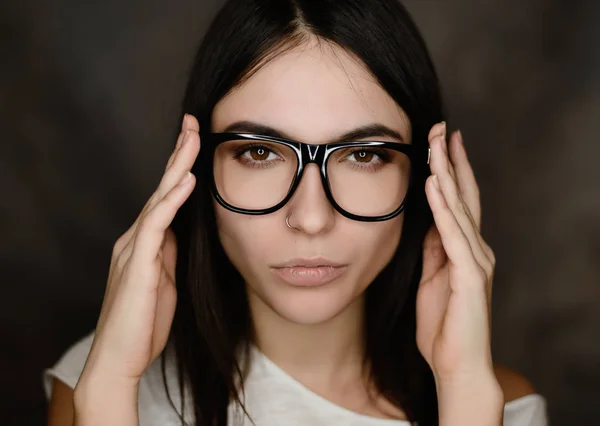 Portrait of woman wearing glasses. Selective focus.