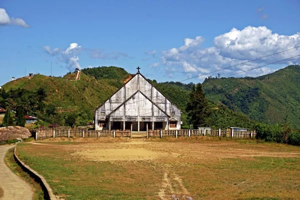 Wodden church in isolated village Longwa, Nagaland. In Northeast India people turned from animistic beliefes to christianity during the British colonial time. Especially tribes in the hilly areas of Meghalaya and Nagaland converted into christians.