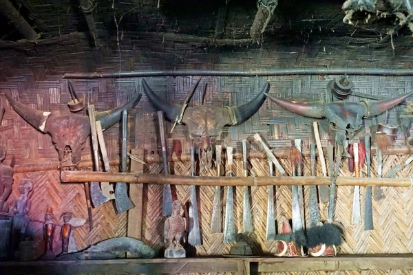 In the tribal village of Longwa local Konyak people decorate their longhouses with various animal skulls like Mithuns or Gayals and other hunted animals. Their traditional weapons are often displayed as well.
