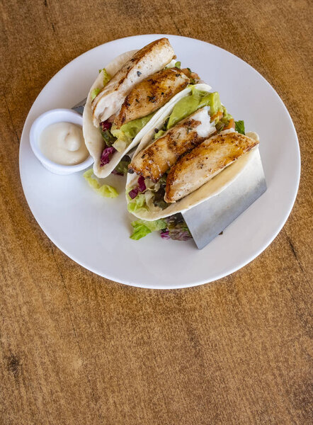 Fish Tacos Served in a Restaurant