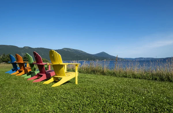 Row Bright Colorful Adirondack Chairs Facing Bonne Bay Sunny Day — Stock Photo, Image