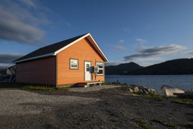Woody Point, Canada, August 27, 2019: Colorful House by the Shore of Bonne Bay Newfoundland