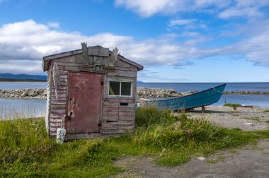 Abandoned Fishing Shack and Boat in Green Point, Gros Morne National Park, Newfoundland clipart